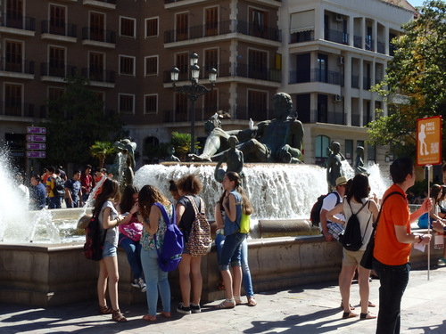 A group of American high school students waiting.